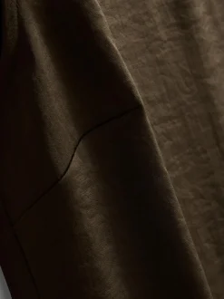 Asymmetrisches Top aus strukturiertem Satin mit Schulterpolstern