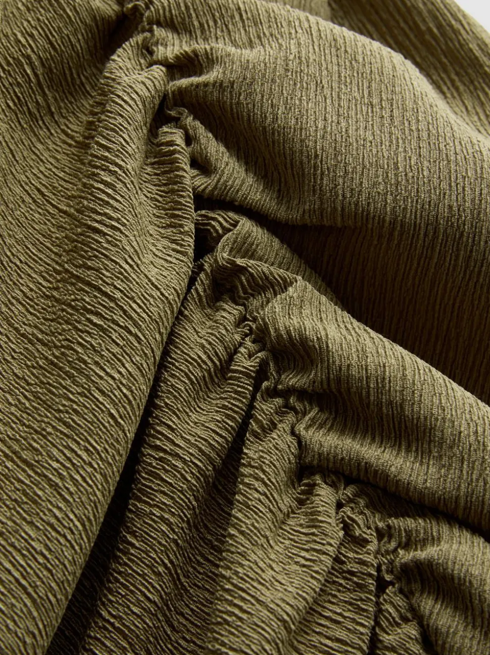 Asymmetrisches Top in Knitteroptik
