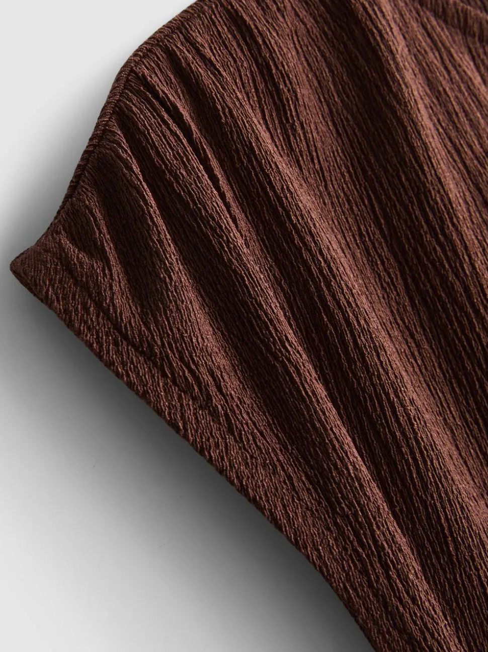 Asymmetrisches Top in Knitteroptik