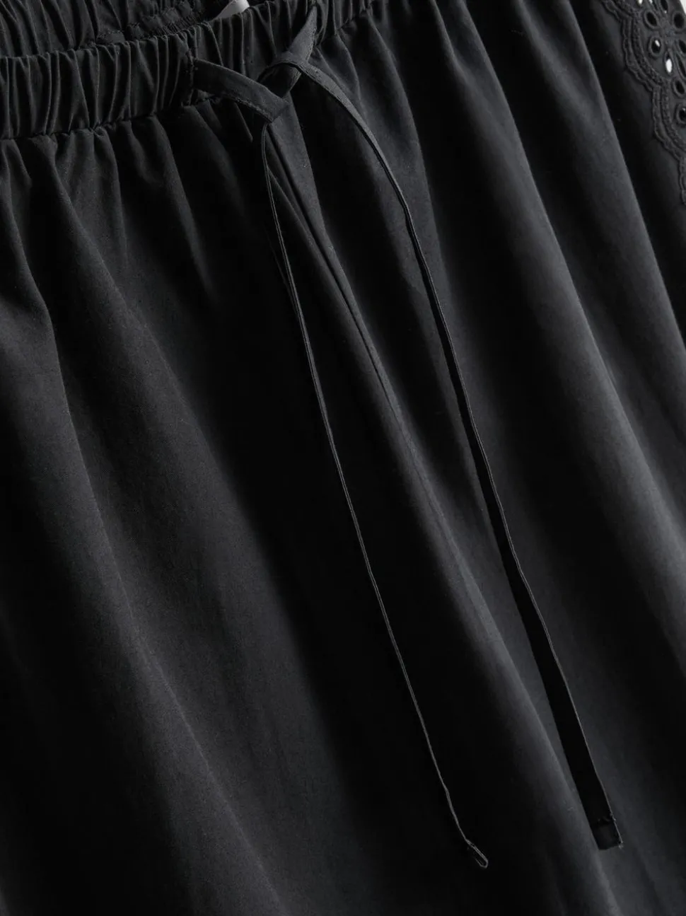 Baumwollhose mit weitem Bein und Lochstickerei