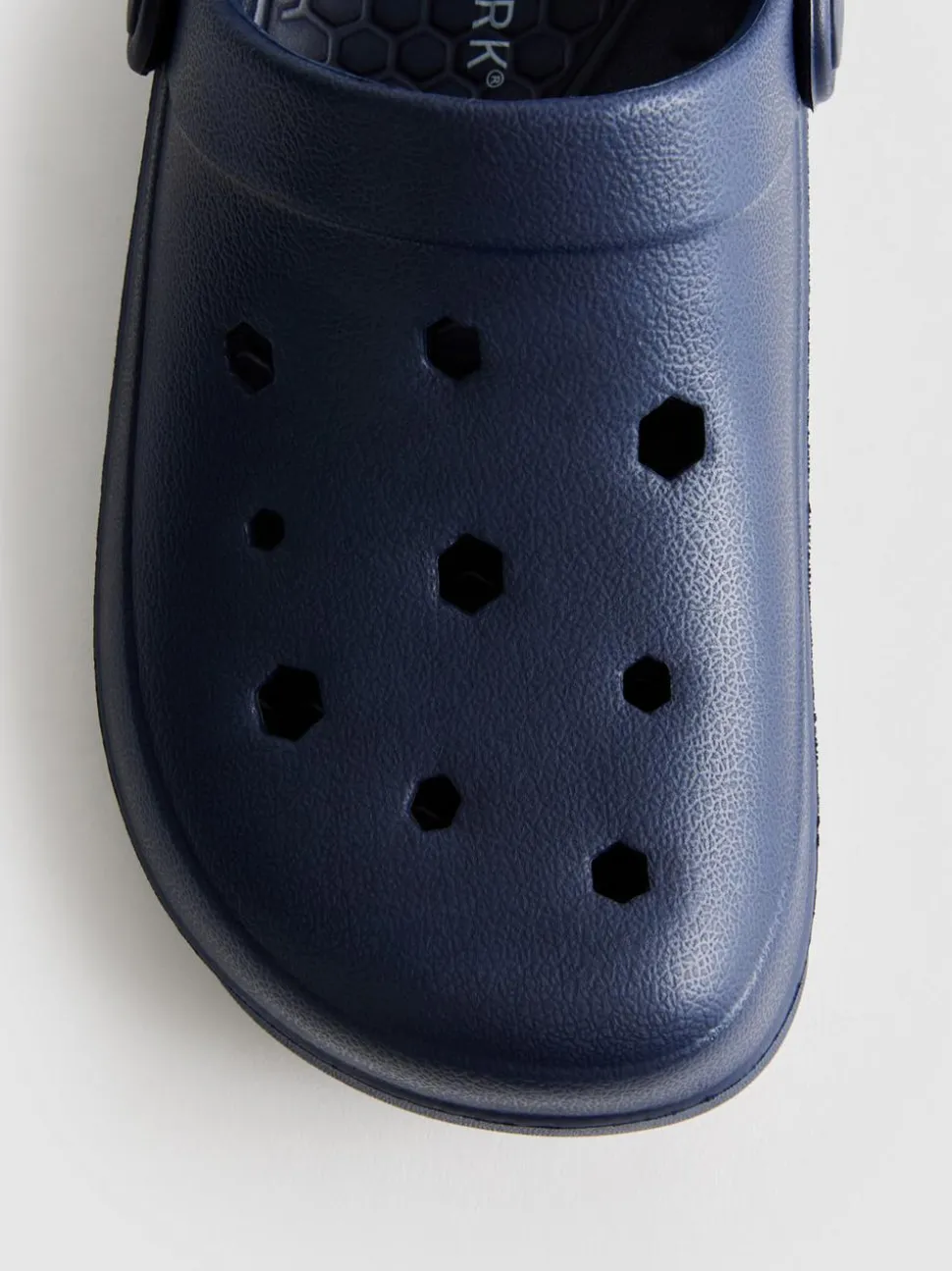 Clogs mit Fersenriemchen