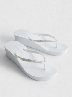 Flipflops mit Keilabsatz und Strasssteinen