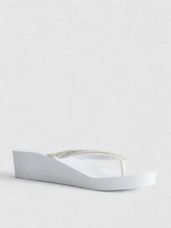 Flipflops mit Keilabsatz und Strasssteinen