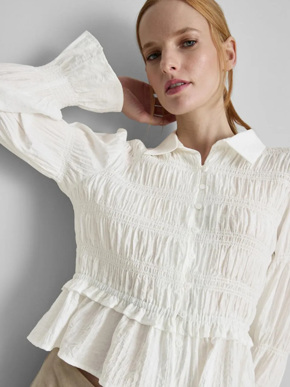 Gekräuselte Bluse mit Schößchensaum