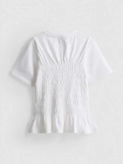 7–15 Jahre | Gesmoktes T-Shirt mit Schößchen