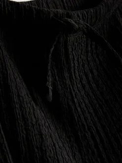 7–15 Jahre | Strukturierte Ballonhose in Knitteroptik