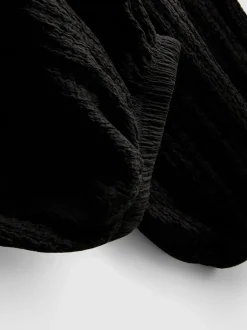 7–15 Jahre | Strukturierte Ballonhose in Knitteroptik