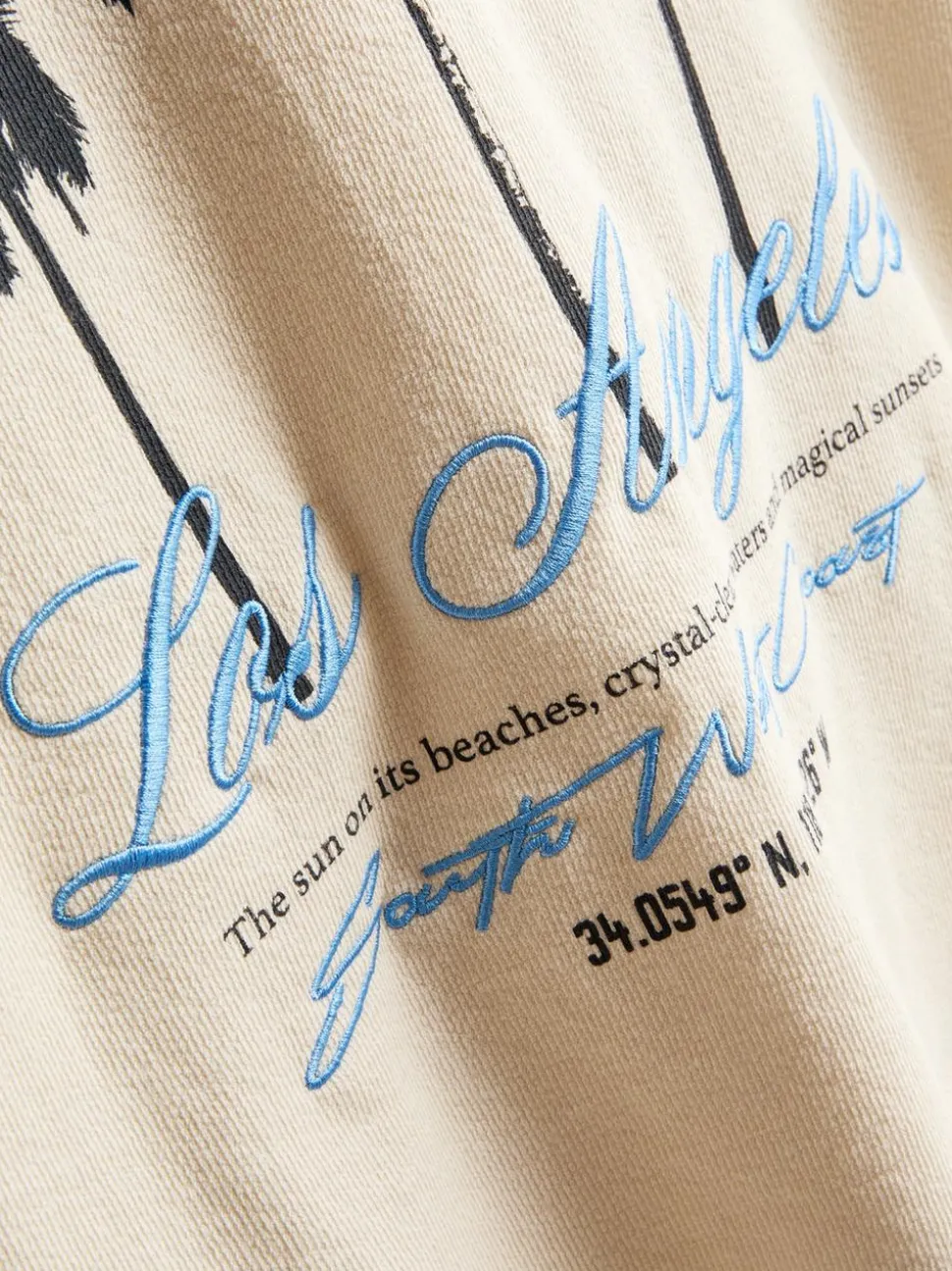 7–15 Jahre | Strukturiertes T-Shirt mit Palmen-Grafik