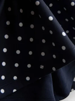 7–15 Jahre | Trägerkleid mit Pünktchenmuster
