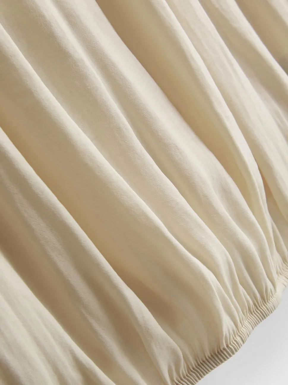 Kurze Cape-Bluse mit Drapierung