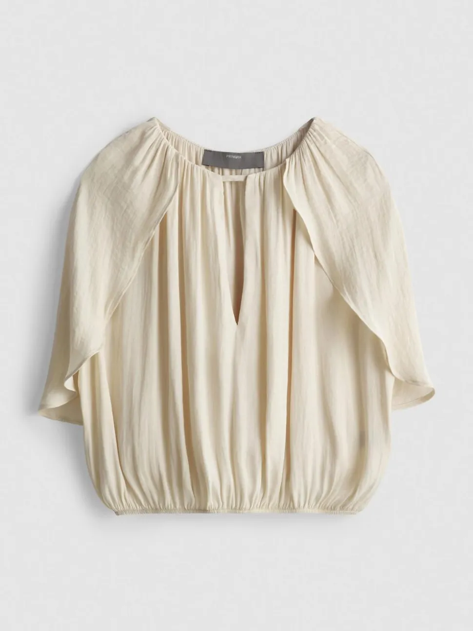 Kurze Cape-Bluse mit Drapierung