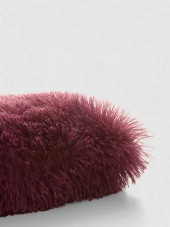 Längliches Kissen im Pompon-Stil