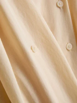 Lässiges Hemd mit rundem Saum