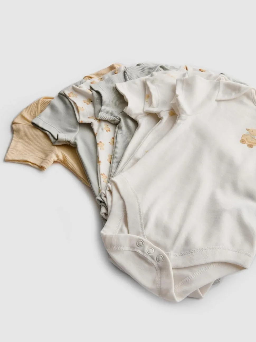0–36 Monate | Bodys aus reiner Baumwolle mit Entengrafik, 7er-Pack