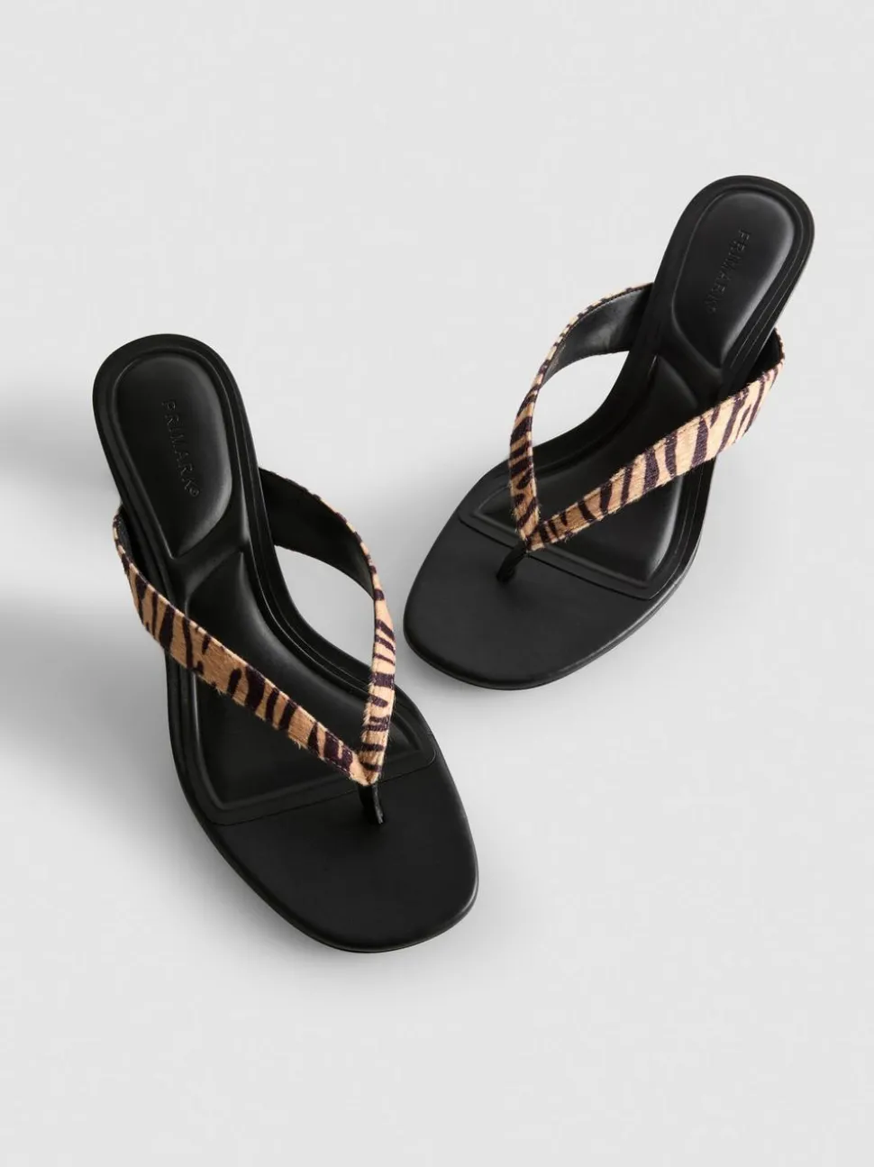 Mules mit Animalprint und Zehensteg