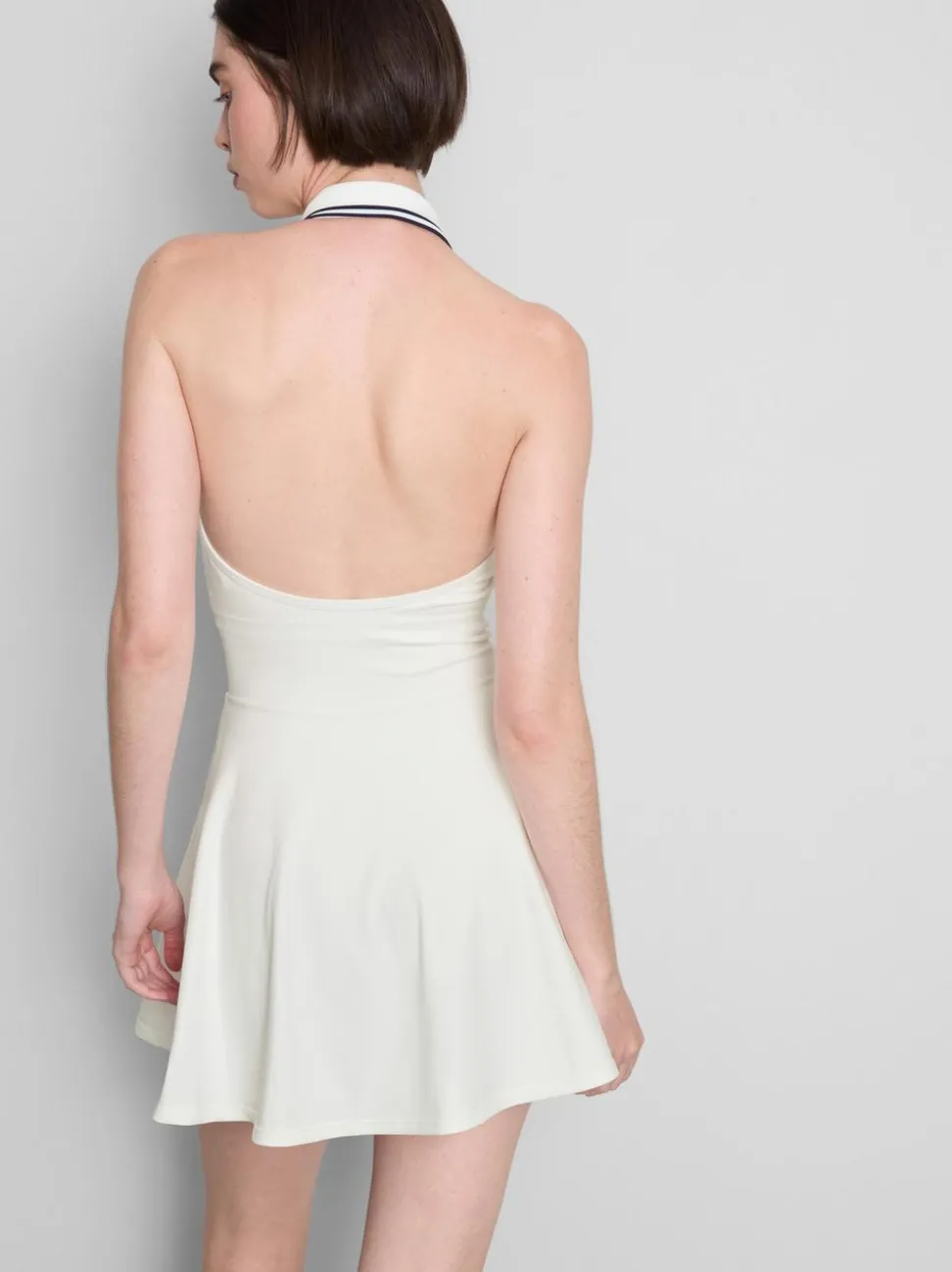 Nahtloses „Prince“ Mini-Tenniskleid