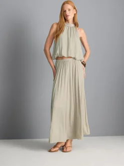 Neckholder-Bluse mit Ballonsaum