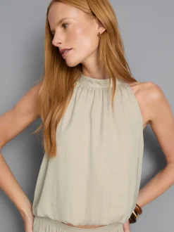Neckholder-Bluse mit Ballonsaum