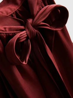 Neckholder-Bluse mit Ballonsaum