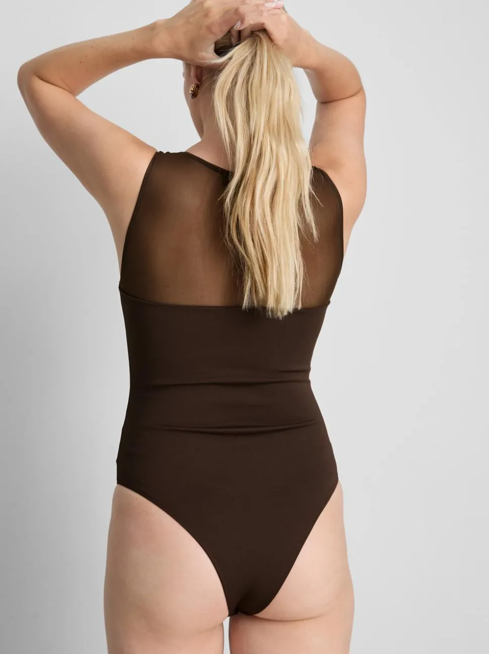 Ärmelloser Body mit Netzeinsatz
