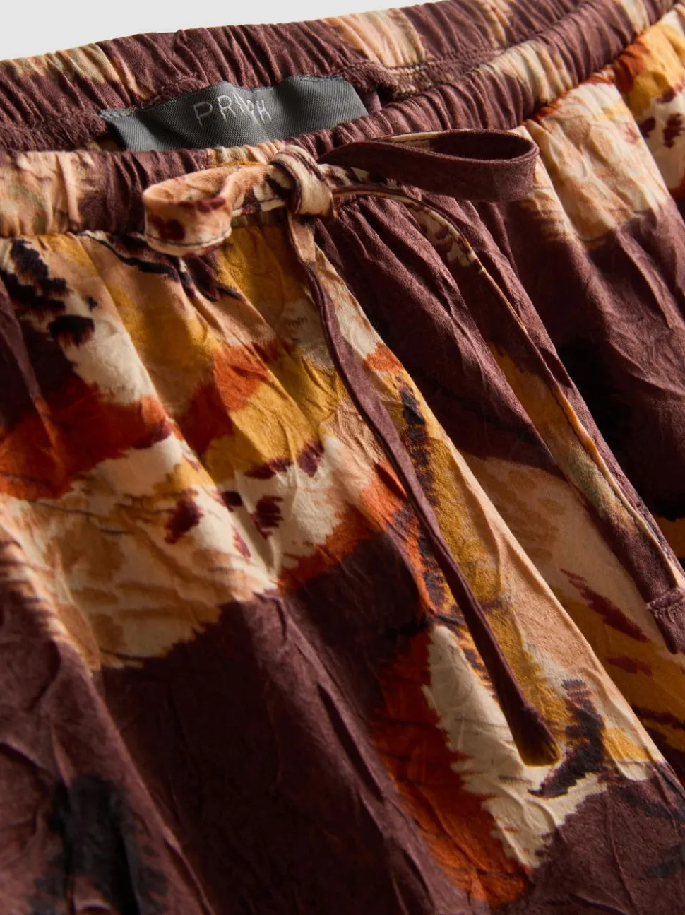 Satin-Hose in Knitteroptik mit weitem Bein und Blumenmuster