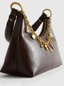 Schultertasche mit Anhängern