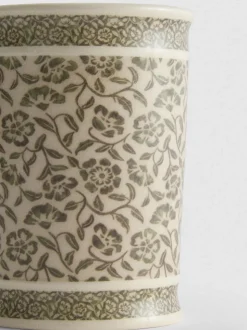 Zahnputzbecher mit Blumenmuster