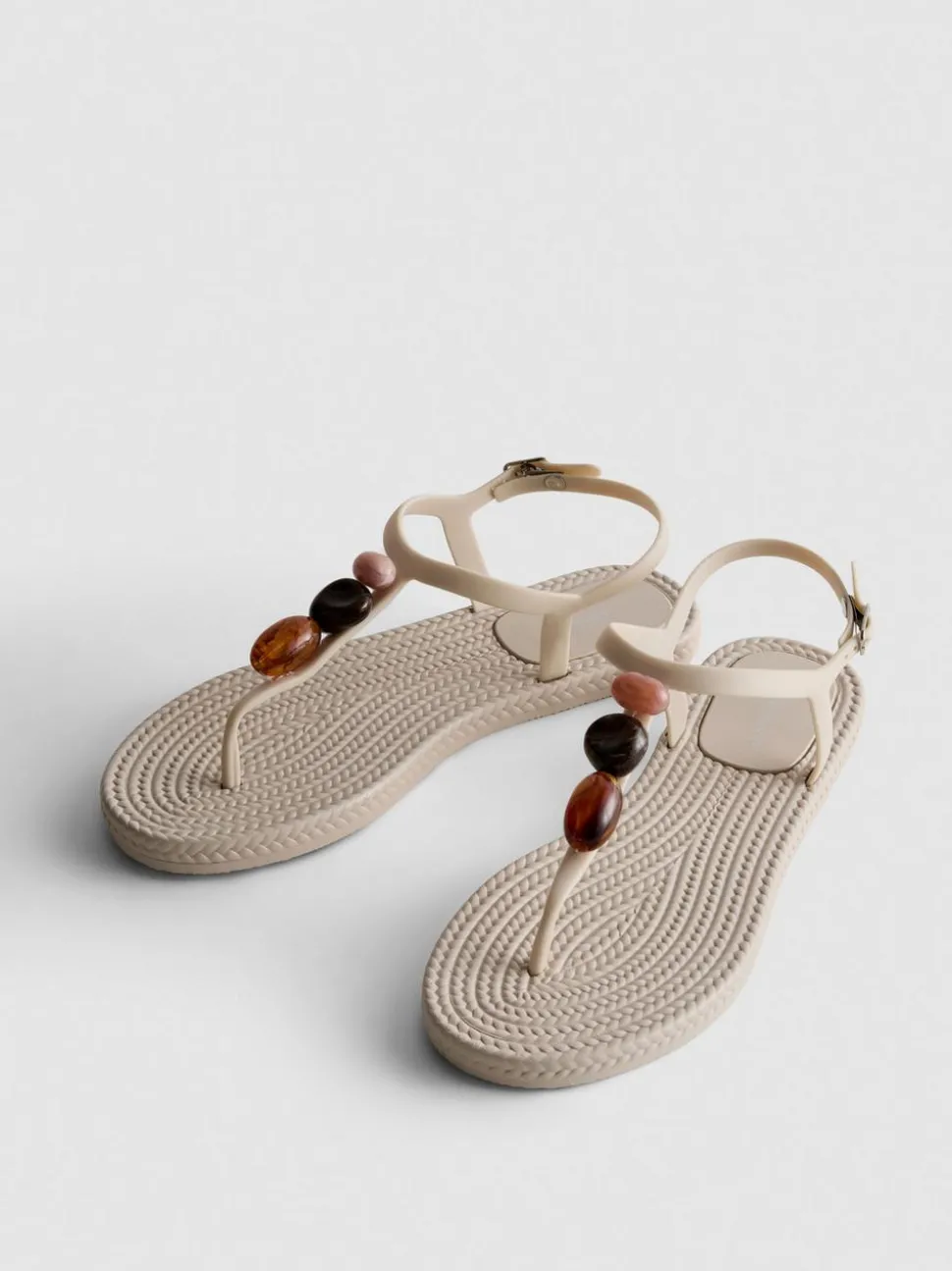 Zehenstegsandalen mit Perlen