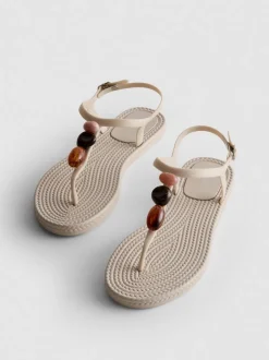 Zehenstegsandalen mit Perlen